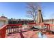 Backyard deck with a dark umbrella at 1123 S Biscay St, Aurora, CO 80017