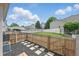 Fenced backyard with stone pavers and access to the community pool at 1203 S Zeno Way # B, Aurora, CO 80017