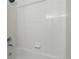 Clean bathroom featuring tiled shower and classic design at 1203 S Zeno Way # B, Aurora, CO 80017