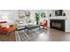 Inviting living room with a fireplace, stylish furniture, and a bright, airy atmosphere at 1203 S Zeno Way # B, Aurora, CO 80017