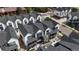 Aerial view showcases modern townhomes, with well-maintained landscaping and community layout at 5189 Vivian St, Wheat Ridge, CO 80033