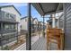 Relaxing balcony space with outdoor seating, offering neighborhood views at 5189 Vivian St, Wheat Ridge, CO 80033