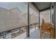 Balcony with outdoor furniture, privacy screen, and a view of other units at 5189 Vivian St, Wheat Ridge, CO 80033