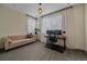 Bedroom with large windows, modern furniture, and plush carpet at 5189 Vivian St, Wheat Ridge, CO 80033