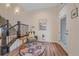 Cozy entryway with a comfortable chair, round rug, and staircase at 5189 Vivian St, Wheat Ridge, CO 80033