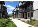 Street view showcases modern townhomes, with well-maintained landscaping and inviting entrances at 5189 Vivian St, Wheat Ridge, CO 80033