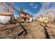 Backyard with a large yard and a play area, offering plenty of space for outdoor activities and enjoying the outdoors at 11970 W Pleasant Ave, Lakewood, CO 80401