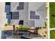 Aerial view of home with solar panels and backyard patio at 13711 Ash Cir, Thornton, CO 80602