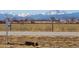 Scenic view of a rural property with snow-capped mountains in the background at 14798 N 115Th St, Longmont, CO 80504