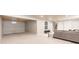 Finished basement area with neutral carpeting and ample space for entertaining or relaxation at 3180 S Albion St, Denver, CO 80222