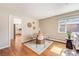 Open dining room with hardwood floors and view of the kitchen, perfect for entertaining at 3180 S Albion St, Denver, CO 80222