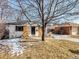 Quaint home featuring a cozy front porch and well-manicured lawn at 3180 S Albion St, Denver, CO 80222