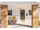 Inviting front porch with comfortable seating and stylish decorative wood columns at 3180 S Albion St, Denver, CO 80222