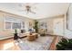 Cozy living room featuring hardwood floors, natural light and stylish furniture at 3180 S Albion St, Denver, CO 80222