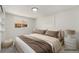Serene bedroom with neutral tones and comfortable bedding at 3581 Olive St, Denver, CO 80207