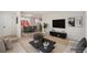 Bright living room with stylish furniture and lots of natural light at 3581 Olive St, Denver, CO 80207