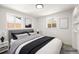 Cozy bedroom with soft lighting and stylish decor at 3581 Olive St, Denver, CO 80207