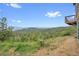 Landscaped backyard with mountain views at 25704 Shiloh, Conifer, CO 80433