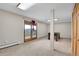 Finished basement area with walkout to a deck and featuring a billiards table at 25704 Shiloh, Conifer, CO 80433