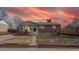 Charming single-story home with a well-maintained front yard and beautiful landscaping at 7818 Florado St, Denver, CO 80221
