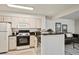 Clean kitchen with stainless steel appliances and granite countertops at 4804 E Kentucky Ave # D, Denver, CO 80246