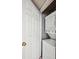 Convenient laundry closet with stacked washer and dryer unit at 4804 E Kentucky Ave # D, Denver, CO 80246