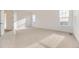 Spacious bedroom featuring new carpet and ample natural light at 3953 Treadway Pt, Castle Rock, CO 80108