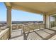 Covered deck showcasing scenic views of the surrounding landscape at 3953 Treadway Pt, Castle Rock, CO 80108