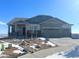 Charming single-story home with a three-car garage and beautiful stone accents on the front elevation at 3953 Treadway Pt, Castle Rock, CO 80108