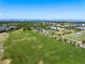 Wide shot of an athletic field, park, and community amenities with mountain backdrop at 8105 E Bayaud Ave, Denver, CO 80230