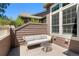 A cozy patio area with comfortable seating and natural light at 8105 E Bayaud Ave, Denver, CO 80230