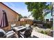 Backyard includes a cozy fire pit with seating, ideal for outdoor gatherings and enjoying cool evenings at 3835 Shefield Dr, Broomfield, CO 80020