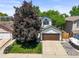 Charming home featuring a well-maintained exterior, two-car garage, and beautiful landscaping, offering curb appeal at 3835 Shefield Dr, Broomfield, CO 80020