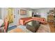 Open-concept living room with a comfy sectional sofa, modern decor, and seamless flow to the outdoors at 3835 Shefield Dr, Broomfield, CO 80020