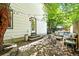 Outdoor patio showcases comfortable seating, string lights, and a welcoming ambiance for entertaining or relaxation at 3835 Shefield Dr, Broomfield, CO 80020