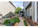 Serene backyard has a covered deck, hammock and thriving green foliage at 21418 E Stroll Ave, Parker, CO 80138
