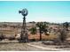 Open community space features a windmill and surrounding natural landscapes at 21418 E Stroll Ave, Parker, CO 80138