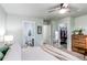 Spacious main bedroom featuring an en-suite bathroom and walk-in closet at 21418 E Stroll Ave, Parker, CO 80138