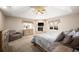 Serene main bedroom featuring a vaulted ceiling, fireplace, and neutral tones for a calming retreat at 7931 W Paine Ave, Lakewood, CO 80235