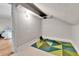 Attic space with geometric rug and additional storage, perfect for an organized home at 2096 S Logan St, Denver, CO 80210