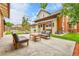 Lush backyard with seating and a basketball court, perfect for relaxing and enjoying outdoor activities at 2096 S Logan St, Denver, CO 80210