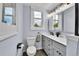 Bathroom offers dual vanities, modern fixtures, and natural light, designed for comfort and elegance at 2096 S Logan St, Denver, CO 80210