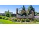 University of Denver sign surrounded by greenery and plants at 2096 S Logan St, Denver, CO 80210