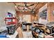 Spacious studio featuring brick walls, track lighting, and ample space for creative projects and storage at 2096 S Logan St, Denver, CO 80210