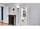 Walk-in closet with ample storage, custom shelves, and a bright interior, optimizing organization at 2096 S Logan St, Denver, CO 80210