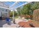 Relaxing backyard with pergola, patio, and mature trees at 5594 S Jasper Way, Centennial, CO 80015