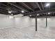 Unfinished basement with neutral walls, modern flooring, and painted ceiling at 7866 S Valentia Way, Centennial, CO 80112