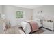 Adorable bedroom with neutral carpeting features whimsical decor and large window at 7866 S Valentia Way, Centennial, CO 80112