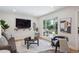 Cozy living room with sliding door access to backyard and modern decor at 7866 S Valentia Way, Centennial, CO 80112