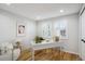 Bright home office with shuttered windows, hardwood floors and modern decor at 7866 S Valentia Way, Centennial, CO 80112